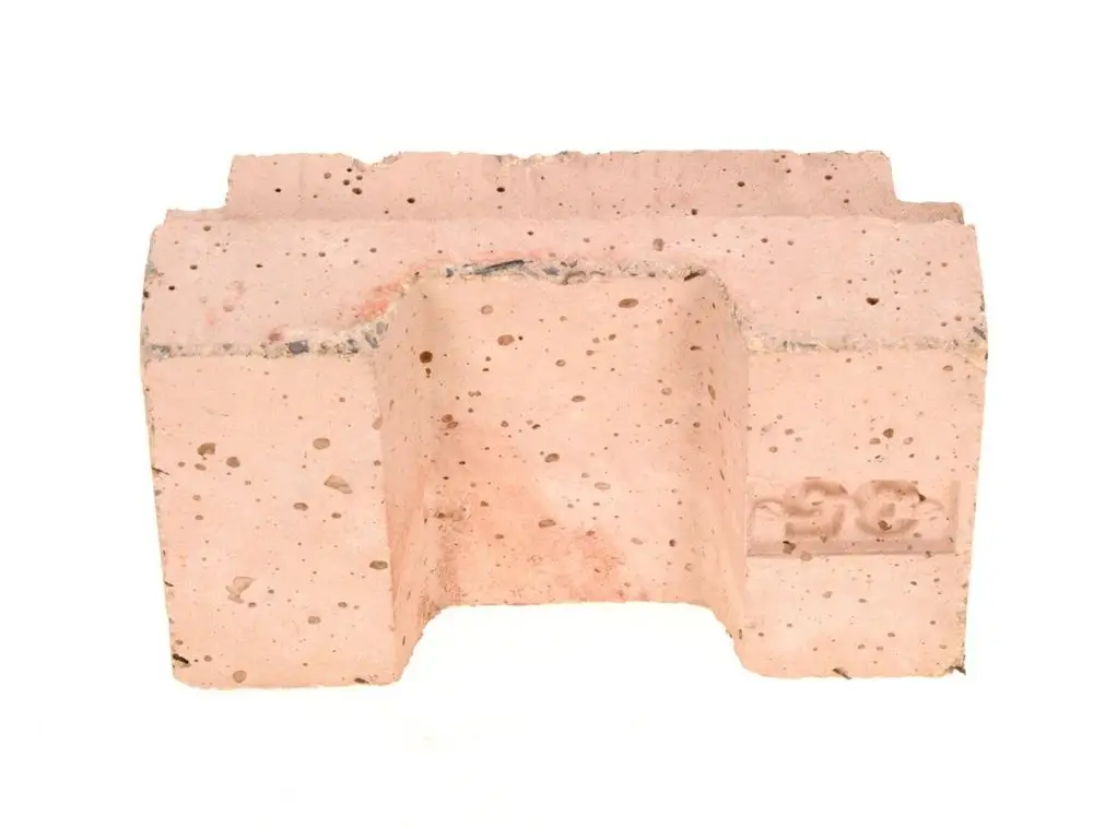 Keramisches Produkt von Bosch in neutraler Farbgebung, mit deutlichen durchgehenden Löchern und einer strukturierten Oberfläche.